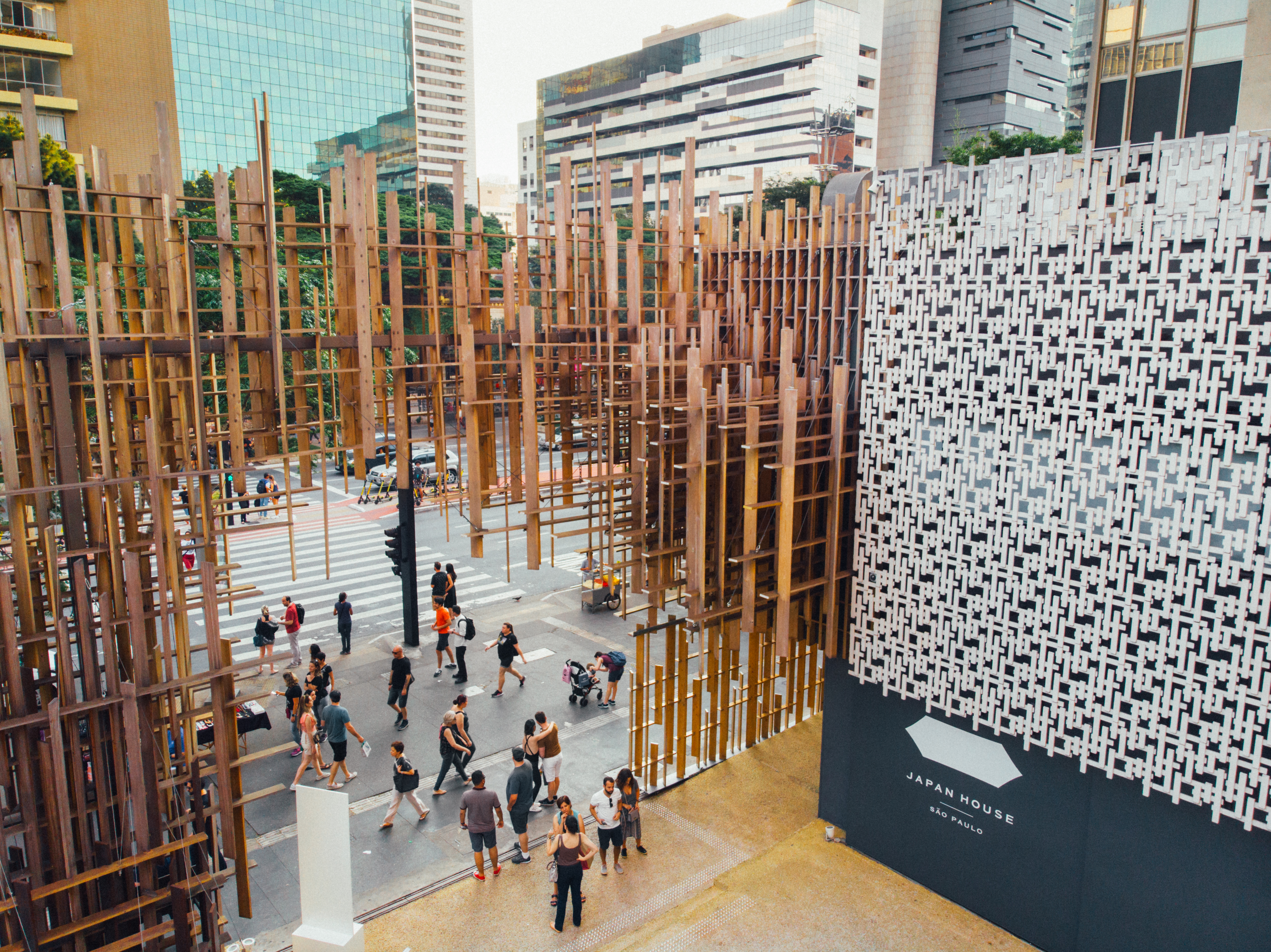 A sophisticatedly decorated museum boasts a wooden facade of interlaced cuts and a stylish, minimalist library.