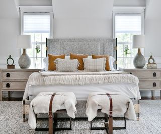 neutral ralph lauren inspired bedroom with layers of different materials and design aesthetics