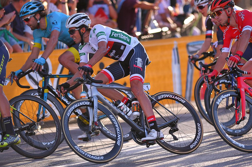 Alberto Contador rides in the bunch during the final Vuelta stage