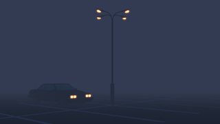 Relaxing PC game — An Islands: Non-places vignette of a car beneath a parking lot lightpost, with only the car's headlights and the post's lamps offering blots of color variation from a monochrome backdrop.