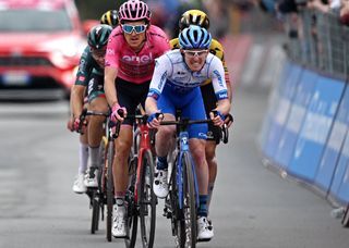 CRANS-MONTANA, SWITZERLAND - MAY 19: (L-R) Geraint Thomas of The United Kingdom and Team INEOS Grenadiers - Pink Leader Jersey and Eddie Dunbar of Ireland and Team Jayco AlUla cross the finish line during the 106th Giro d'Italia 2023, Stage 13 a 75km stage from Le Chable to Crans-Montana - Valais 1456m - Stage shortened due to the adverse weather conditions / #UCIWT / on May 19, 2023 in Crans-Montana, Switzerland. (Photo by Stuart Franklin/Getty Images,)