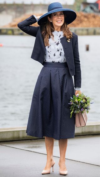 Queen Mary wearing a nautical-inspired outfit