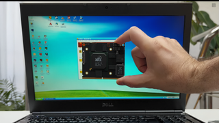 Voodoo4 AGP held-up next to an M4800