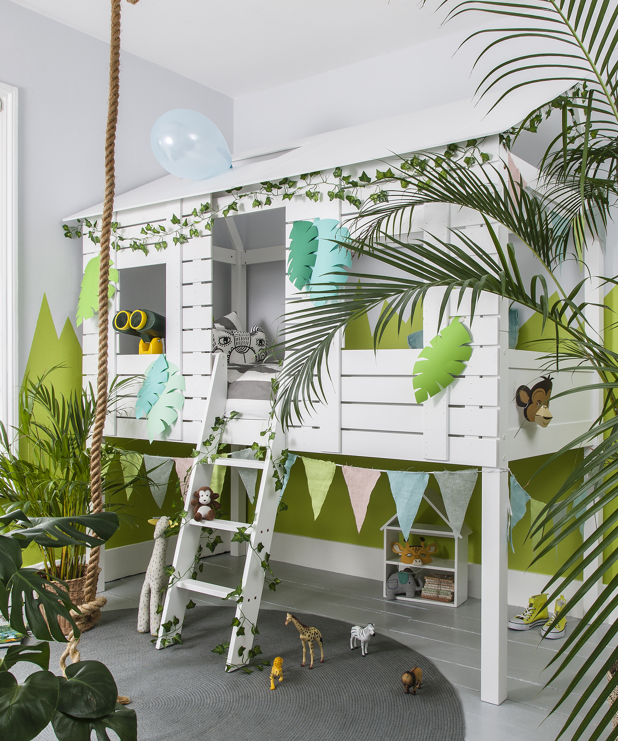 White tree house style bunk bed design with palm trees and bunting by Noa and Nani