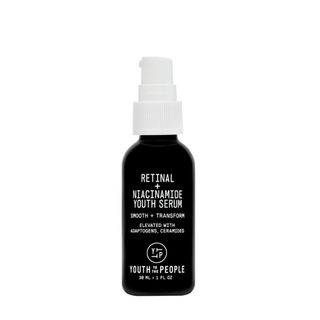 A black 30ml retinol serum with a white pump top.