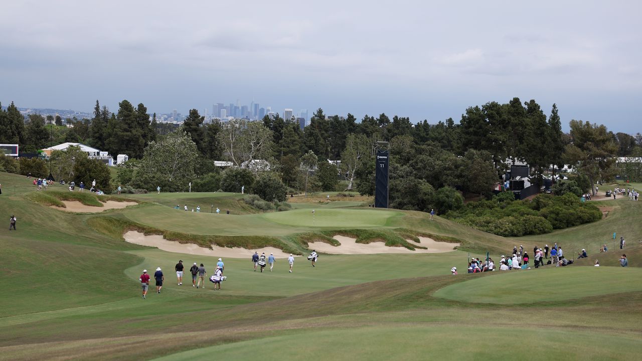  Shane Lowry of Ireland and Viktor Hovland of Norway walk on the 11th hole during a practice round prior to the 123rd U.S. Open Championship at The Los Angeles Country Club