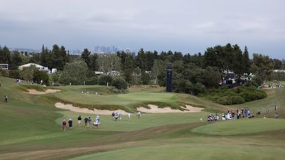  Shane Lowry of Ireland and Viktor Hovland of Norway walk on the 11th hole during a practice round prior to the 123rd U.S. Open Championship at The Los Angeles Country Club