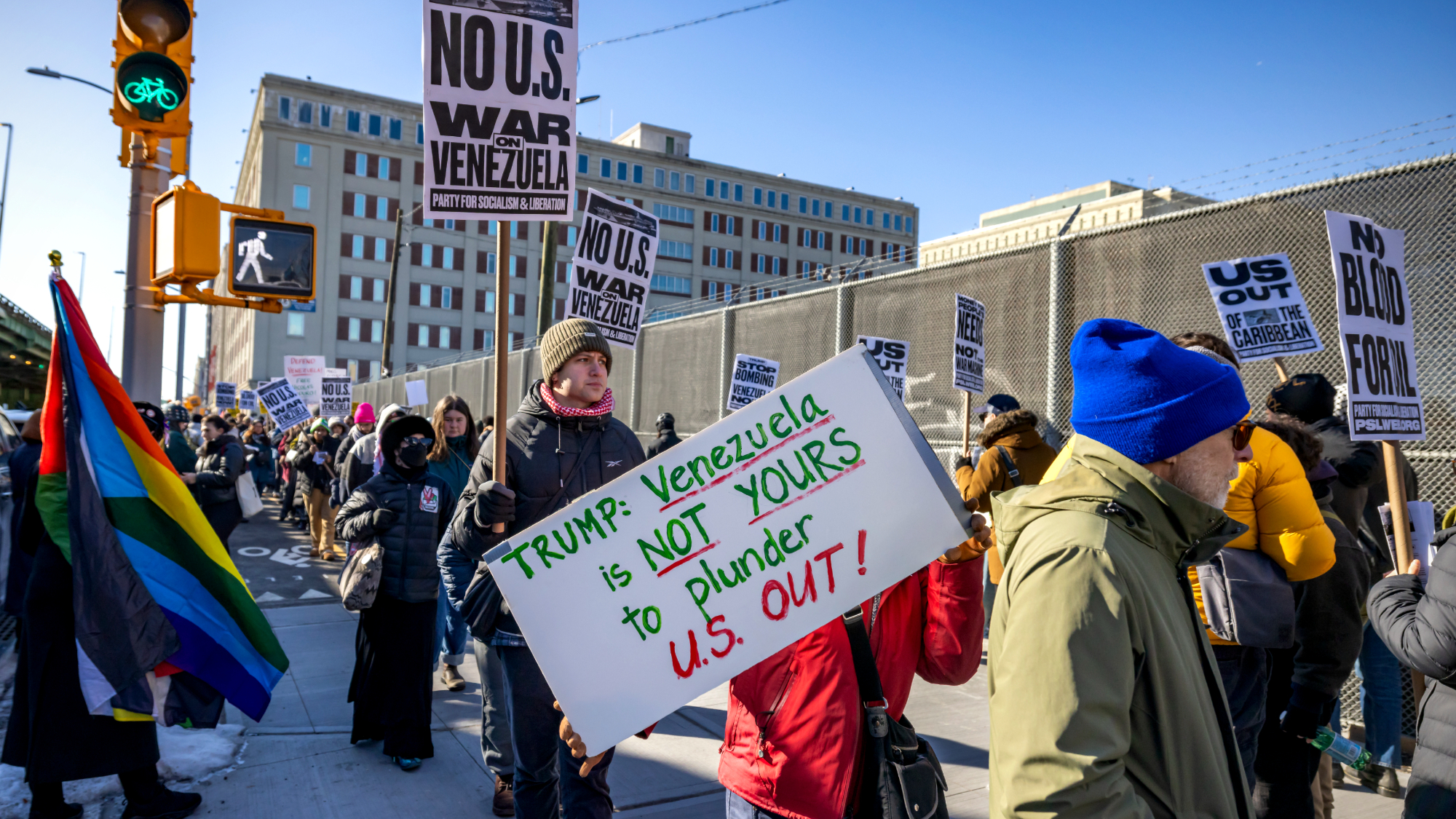 People protest against President Donald Trump's Venezuela military operations in New York City.