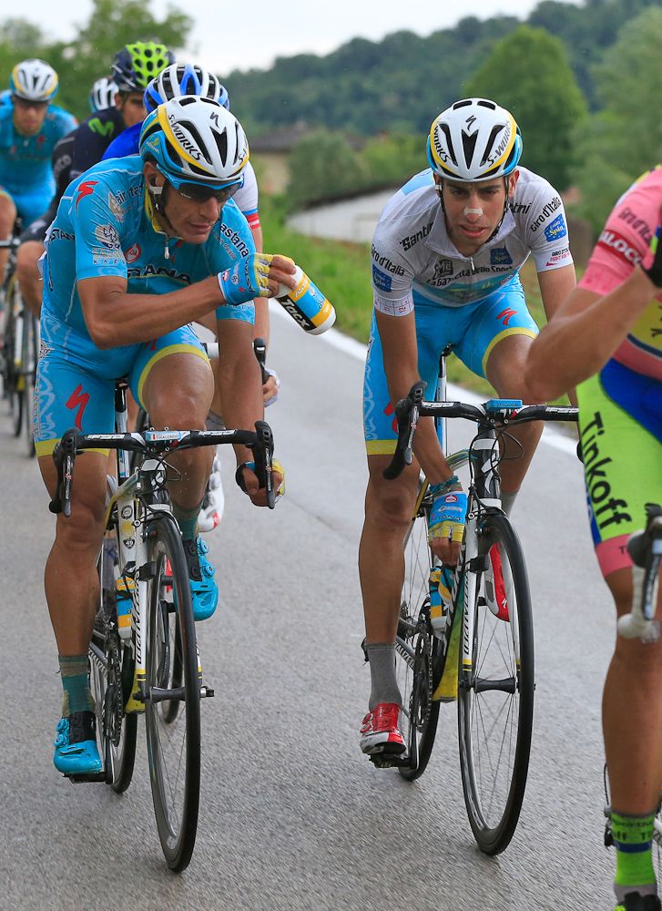 Aru gets a bottle during stage 12.