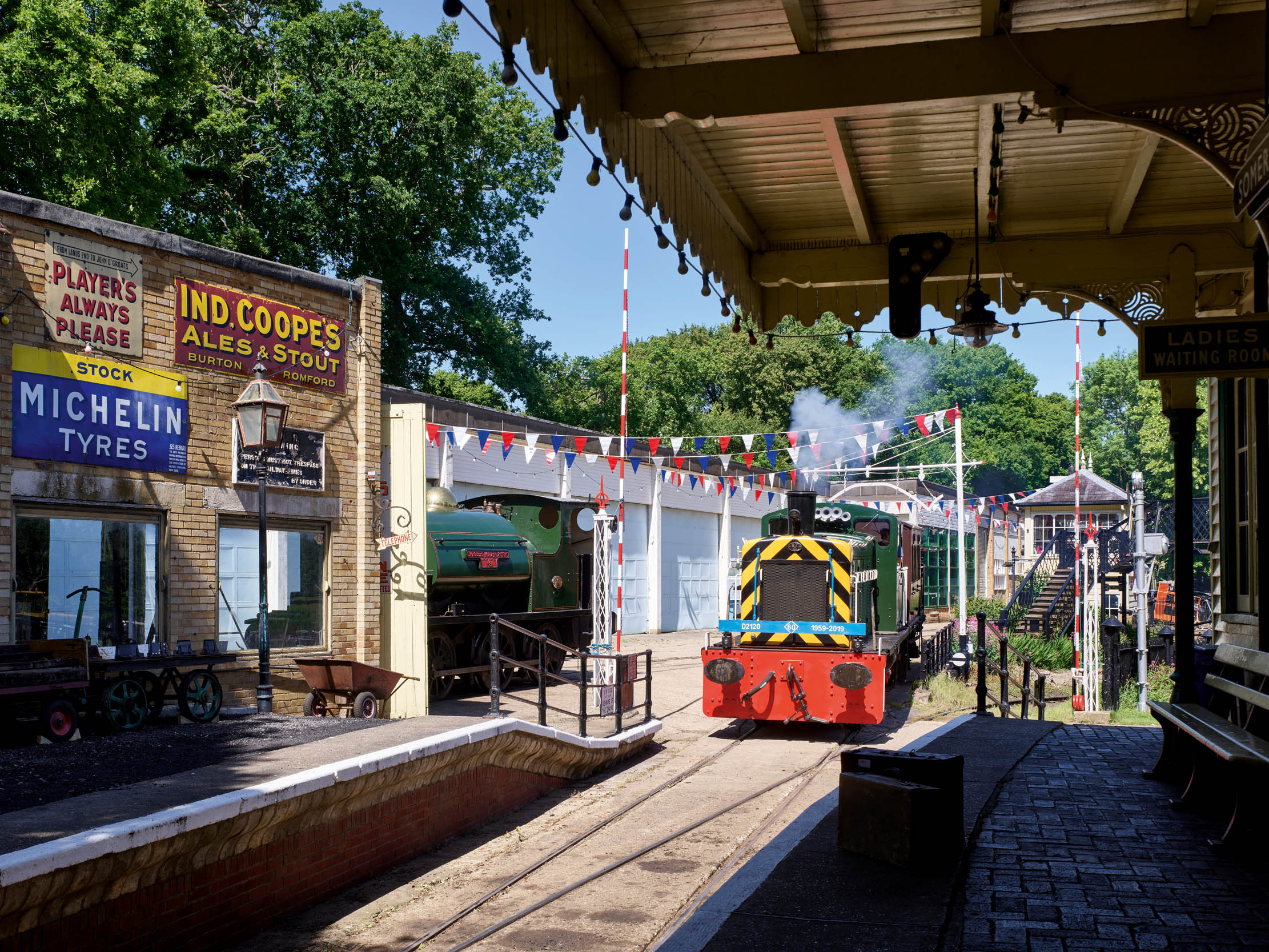 Fig 1: A train pulls into Fawley Hill station, saved from Somersham, Cambridgeshire, and the heart of the park’s railway network — Fawley Hill, Buckinghamshire. ©Paul Highnam for Country Life