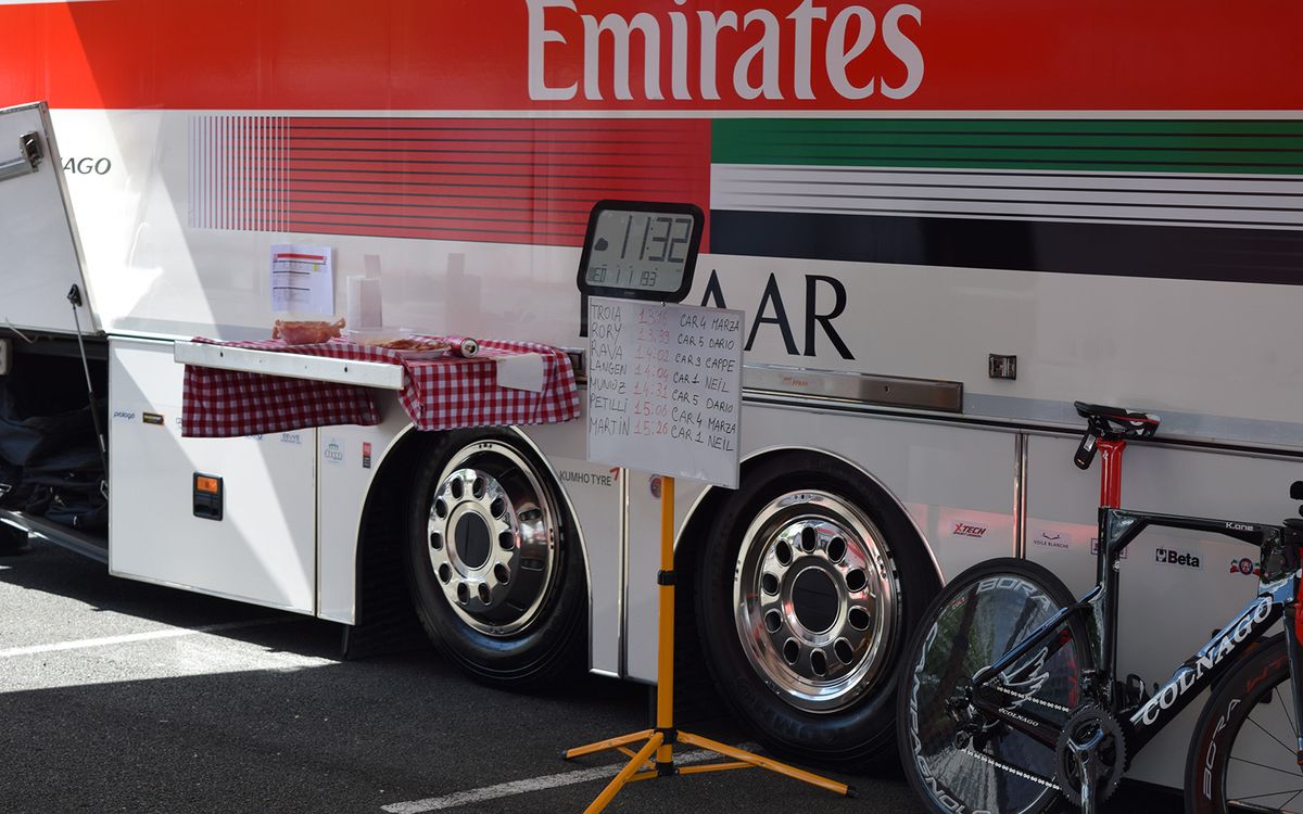 UAE Team Emirates used a simple whiteboard to denote when each rider needs to begin their warm-up, their start time and which DS is driving the follow car