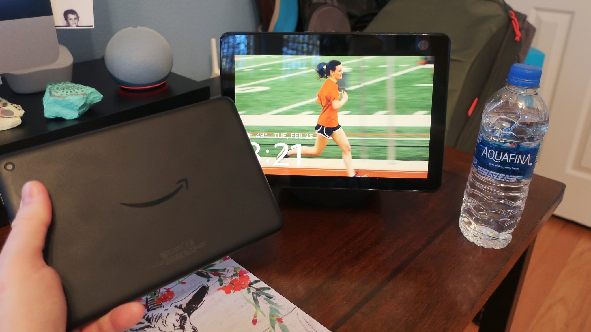 The Amazon Echo Show 10 compared to an Echo Dot and Fire HD 8 in size