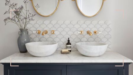 Double bathroom sink unit with brushed brass taps to demonstrate why knowing how to clean brass is key in bathrooms