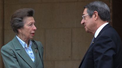 Cyprus' President Nicos Anastasiades and Britain's Princess Anne, left, shake hands after a meeting at the presidential palace in Nicosia, Cyprus, Wednesday, Jan. 11, 2023. Princess Anne visited British soldiers serving with a United Nations peacekeeping force on ethnically divided Cyprus.