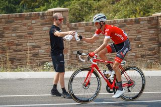Trek-Segafredo's Peter Stetina grabs a bottle during stage 5 at the Tour of Utah