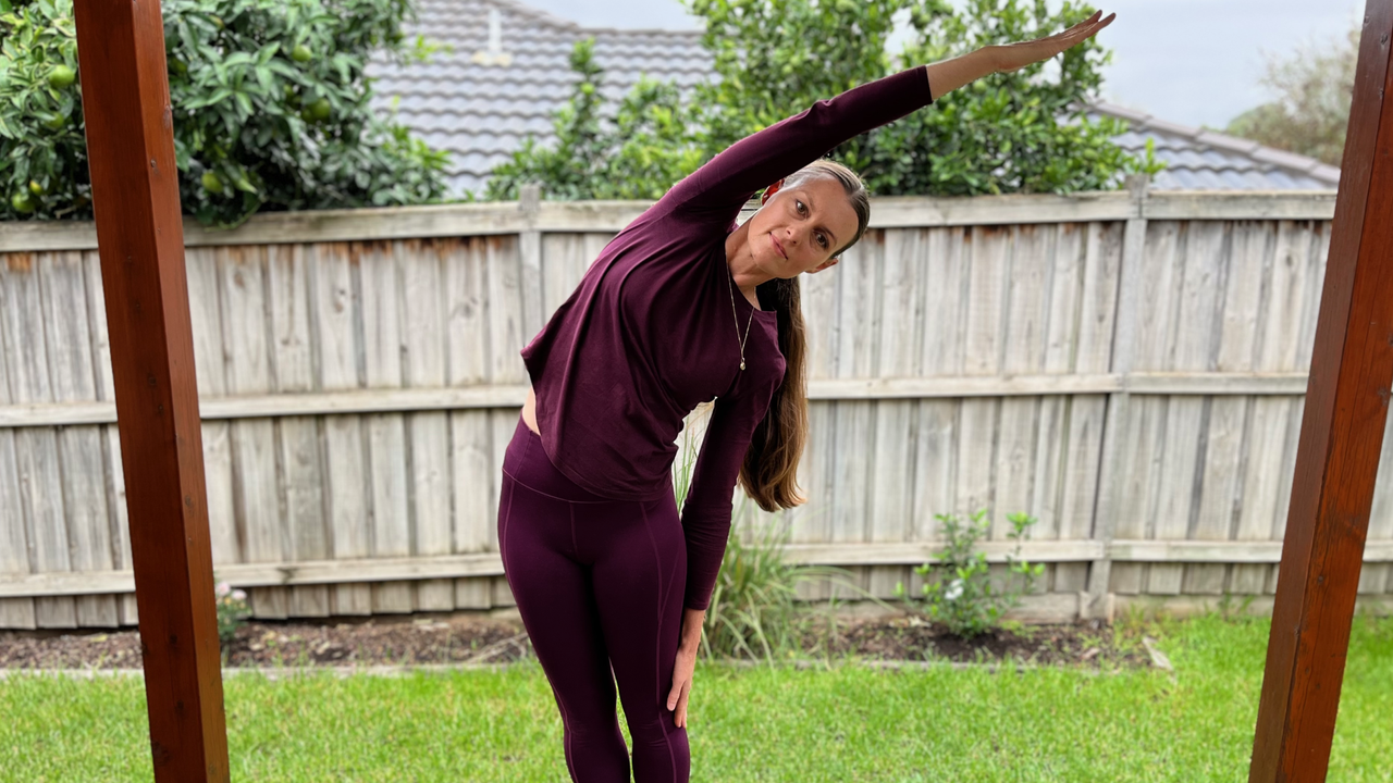 Amy Landry performs a lateral spinal lean