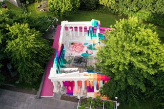 Aerial view of a colourful parthenon in a park