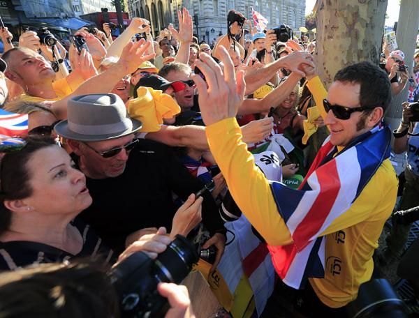Bradley Wiggins (Sky) greets some fans in Paris.