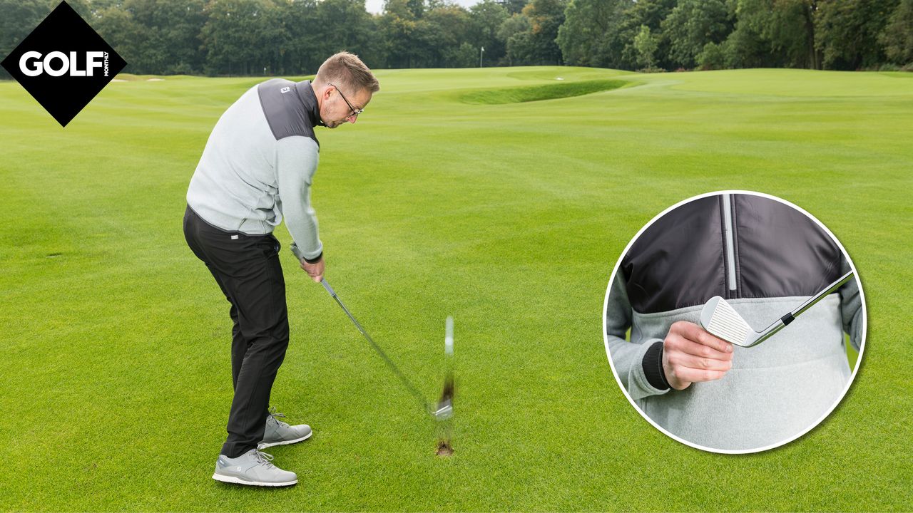 PGA pro Nick Drane hitting an iron shot at Woburn