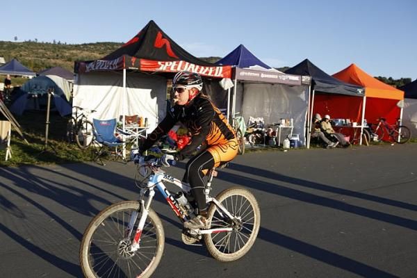 Jo Wall catches a snack on her way through the pit
