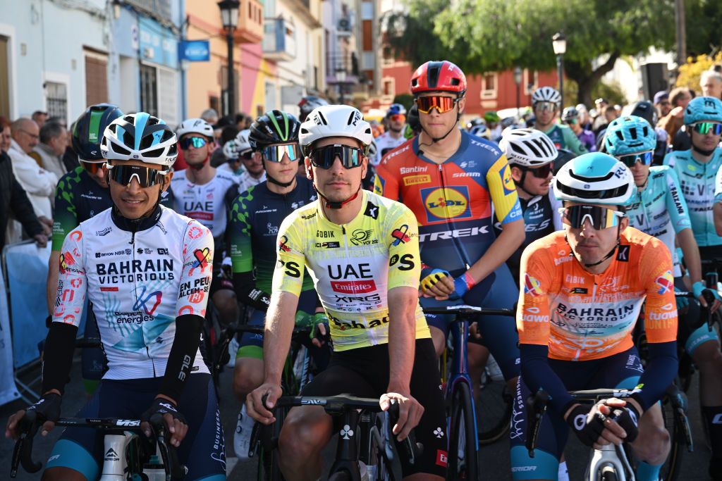 OROPESA DEL MAR SPAIN FEBRUARY 08 LR Santiago Buitrago of Colombia and Team Bahrain Victorious Polka Dot Mountain Jersey Joao Almeida of Portugal and UAE Team Emirates XRG Yellow Leader Jersey and Pello Bilbao of Spain and Team Bahrain Victorious Orange Points Jersey prior to the 76th Volta a la Comunitat Valenciana 2025 Stage 4 a 181km stage from Oropesa del Mar to Portell de Morella 1078m on February 08 2025 in Oropesa del Mar Spain Photo by Szymon GruchalskiGetty Images