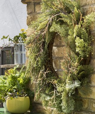 green wreath with pots