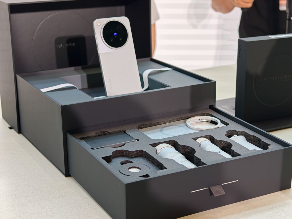The Vivo X500 Pro Max phone complete photographer's kit, with telephoto converters, grip, additional cases and more, in black presentation box
