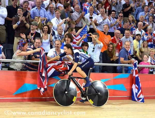 Dani King greeting family and fans after winning gold in the team pursuit