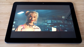 Tablet showing Margot Robbie in Birds of Prey