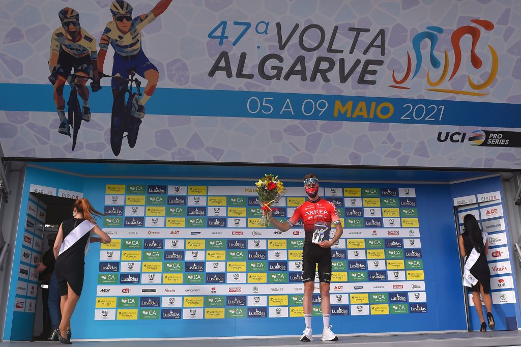 ALTO DO MALHO LOUL PORTUGAL MAY 09 Elie Gesbert of France and Team Arka Samsic stage winner celebrates at podium during the 47th Volta Ao Algarve 2021 Stage 5 a 1701km stage from Albufeira to Alto do Malho 510m Loul VoltAlgarve VAlgarve2021 on May 09 2021 in Alto do Malho Loul Portugal Photo by Luc ClaessenGetty Images