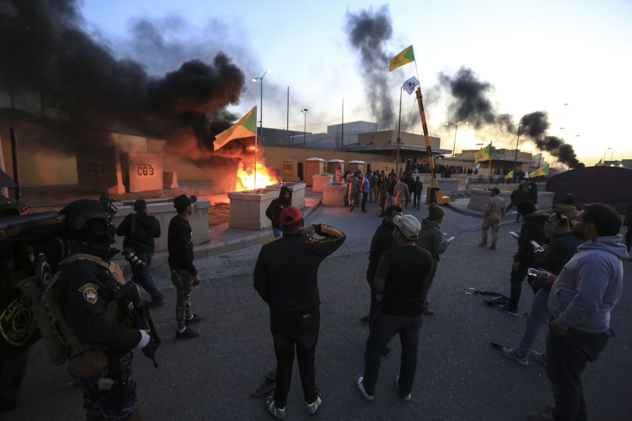 BAGHDAD, IRAQ - DECEMBER 31: Outraged Iraqi protesters storm the U.S. Embassy in Baghdad, protesting Washington&amp;#039;s attacks on armed battalions belong to Iranian-backed Hashd al-Shaabi forces o