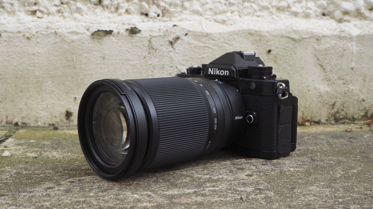 Nikon Z 28-400mm f/4-8 VR lens on a concrete surface