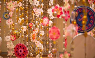 chandelier mobiles, made from fabric flowers, plastic Carnival beads and trinkets