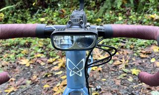 Image shows Outbound Lighting's Detour light mounted on a bike