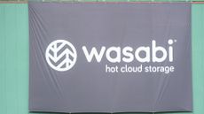 Wasabi Technologies logo on a flag, pictured at the Wasabi Fenway Bowl between the Cincinnati Bearcats and the Louisville Cardinals on December 17, 2022, at Fenway Park in Boston, MA.