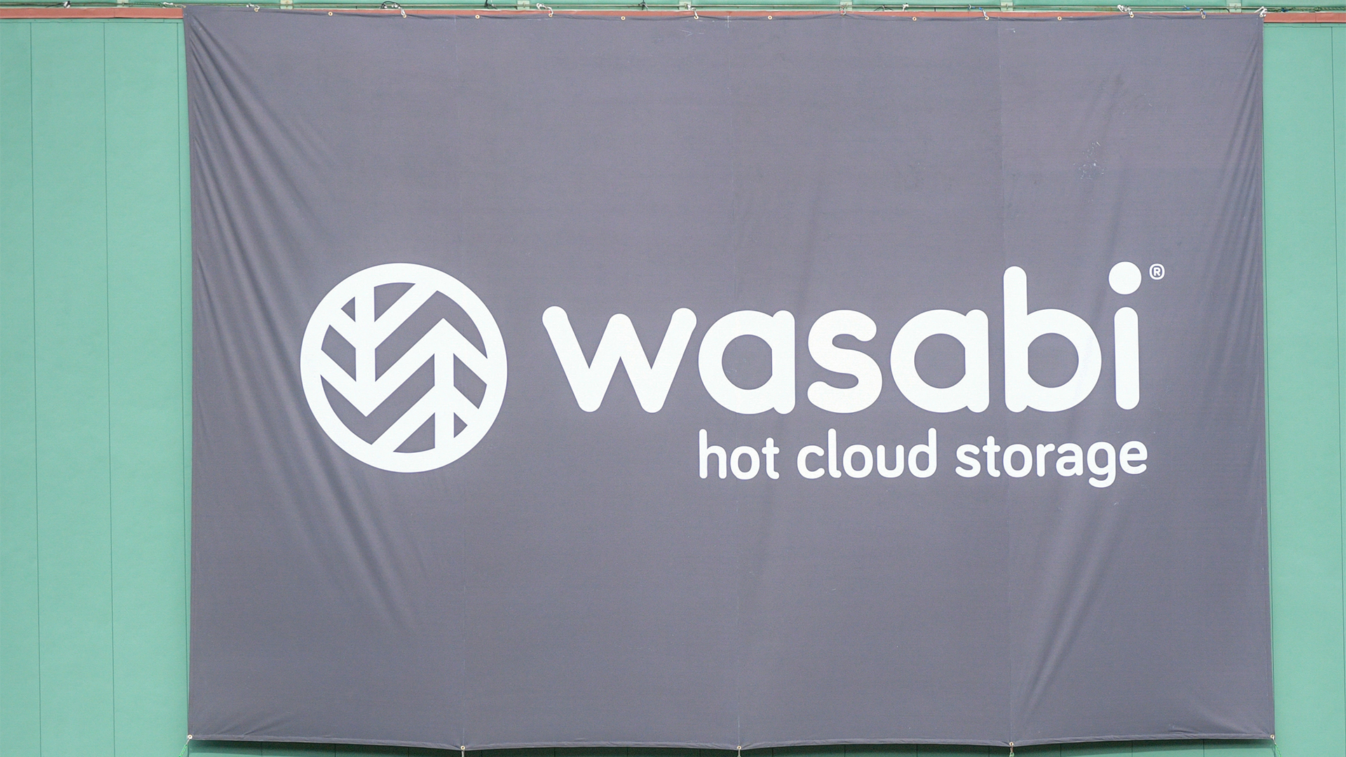 Wasabi Technologies logo on a flag, pictured at the Wasabi Fenway Bowl between the Cincinnati Bearcats and the Louisville Cardinals on December 17, 2022, at Fenway Park in Boston, MA.