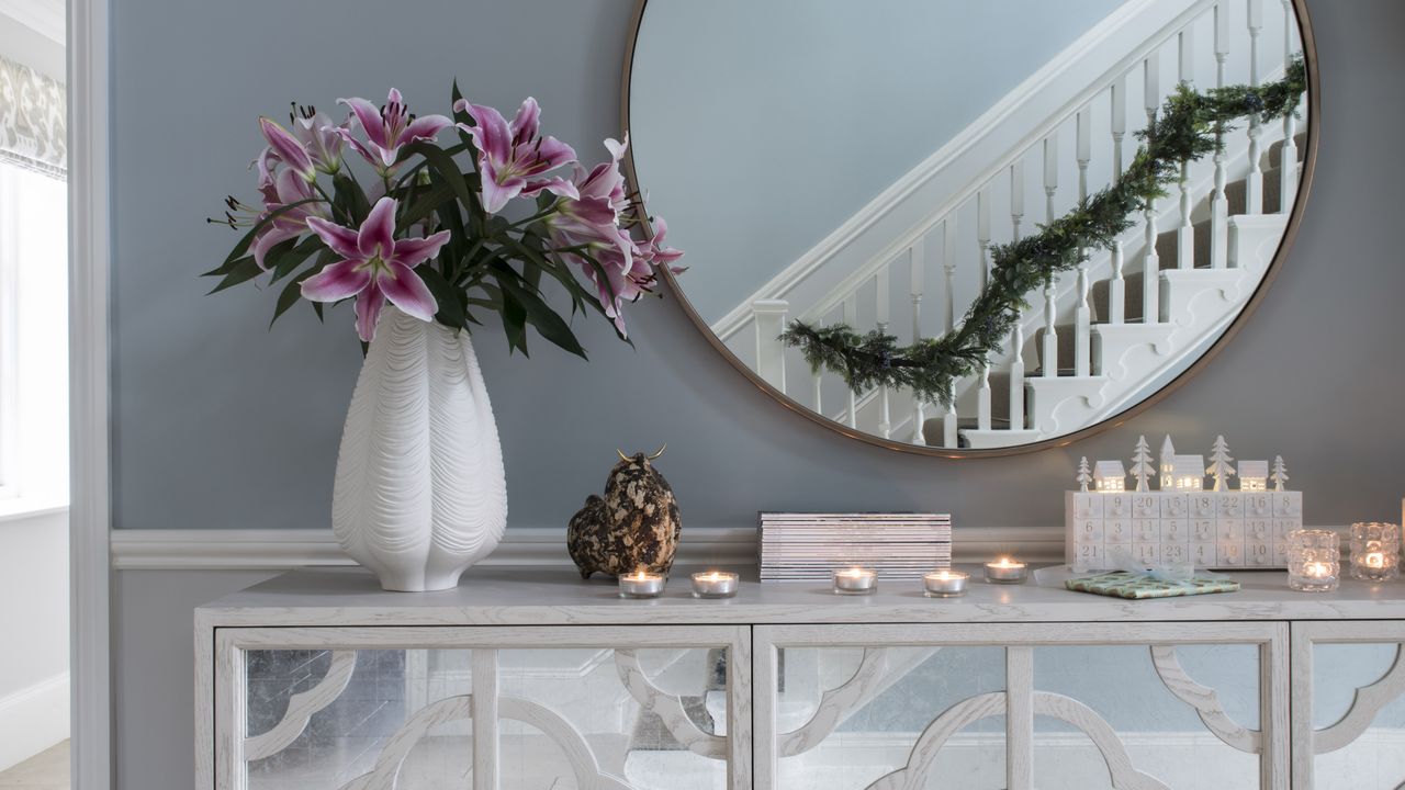 Chrsitmas entryway with candles and Christmas decorations