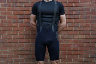 Male cyclist wearing the Castelli Free Unlimited Bib Shorts which are among the best cargo bib shorts