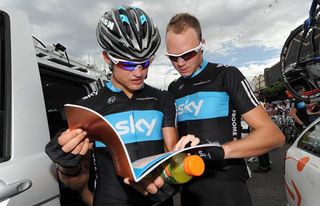 The Sky team studies the road book.