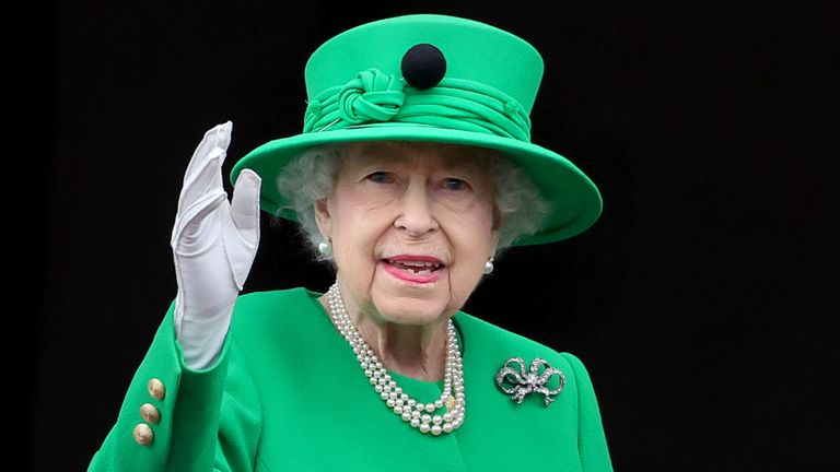 virtual Queen - Queen Elizabeth II waves from the balcony of Buckingham Palace during the Platinum Jubilee Pageant on June 05, 2022 in London, England. 