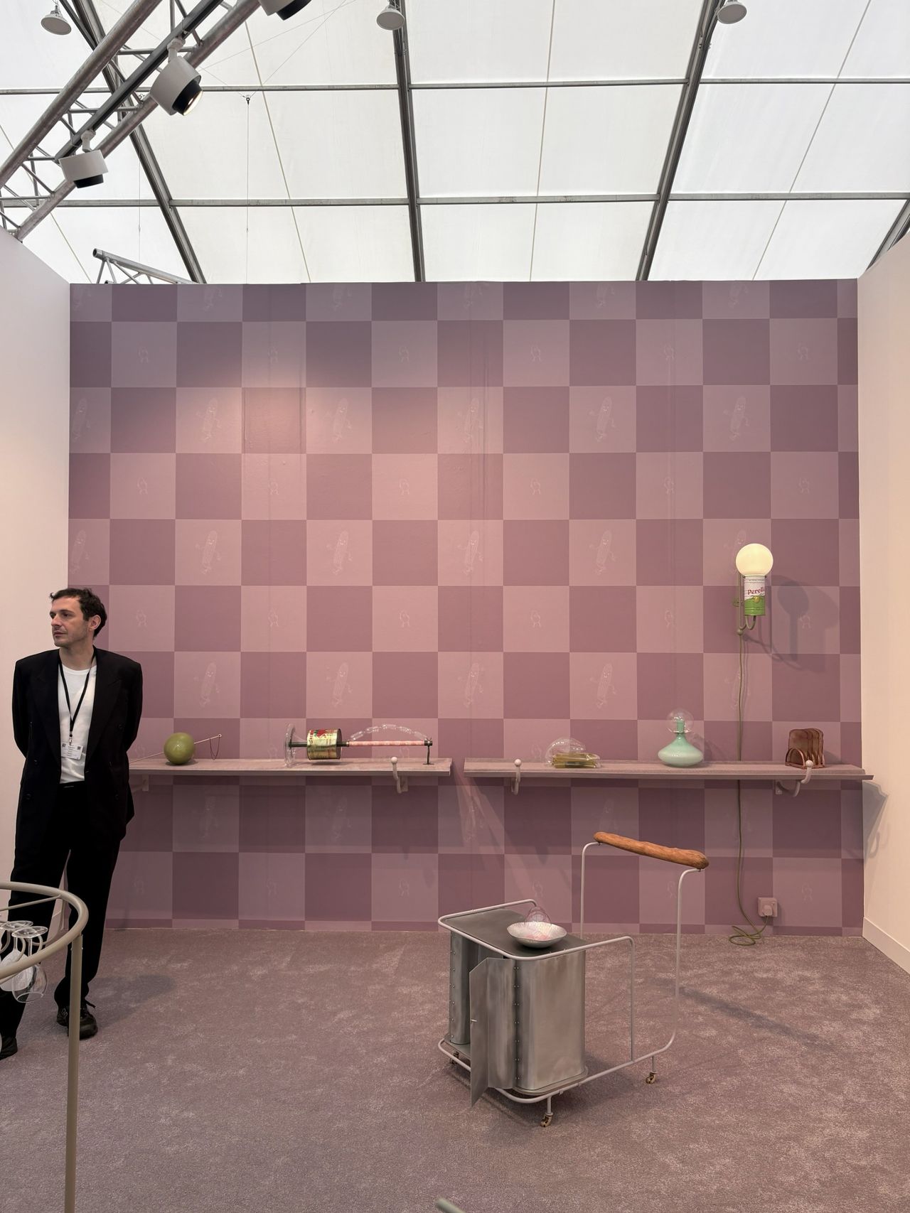 Installation views of an art fair with large-scale sculptural artworks, wall art, and colossal installations.