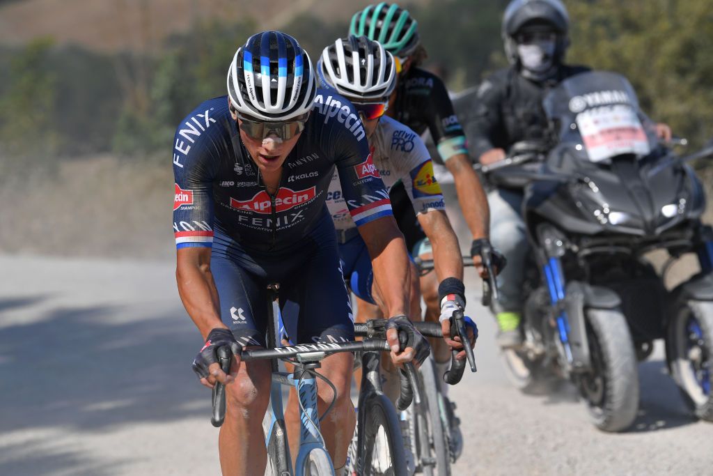SIENA ITALY AUGUST 01 Mathieu Van der Poel of The Netherlands and Team AlpecinFenix Julian Alaphilippe of France and Team Deceuninck QuickStep Daniel Oss of Italy and Team BoraHansgrohe during the Eroica 14th Strade Bianche 2020 Men a 184km race from Siena to SienaPiazza del Campo StradeBianche on August 01 2020 in Siena Italy Photo by Tim de WaeleGetty Images