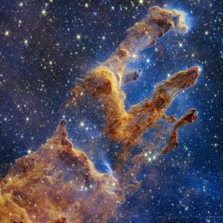 The star-forming Pillars of Creation, imaged in mid-infrared by the JWST in what will surely become an iconic picture.
