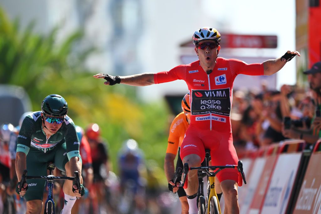 CASTELO BRANCO PORTUGAL AUGUST 19 Wout van Aert of Belgium and Team Visma Lease a Bike Red Leader Jersey celebrates at finish line as stage winner ahead of Kaden Groves of Australia and Team Alpecin Deceuninck Green Points Jersey and Jon Aberasturi of Spain and Team Euskaltel Euskadi during the La Vuelta 79th Tour of Spain 2024 Stage 3 a 1915km stage from Lousa to Castelo Branco UCIWT on August 19 2024 in Castelo Branco Portugal Photo by Tim de WaeleGetty Images