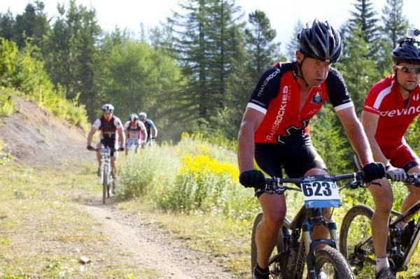 Racers all strung out on a climb