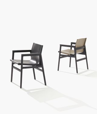 Milan Design Week Poliform Ipanema two dining chairs in black and cream