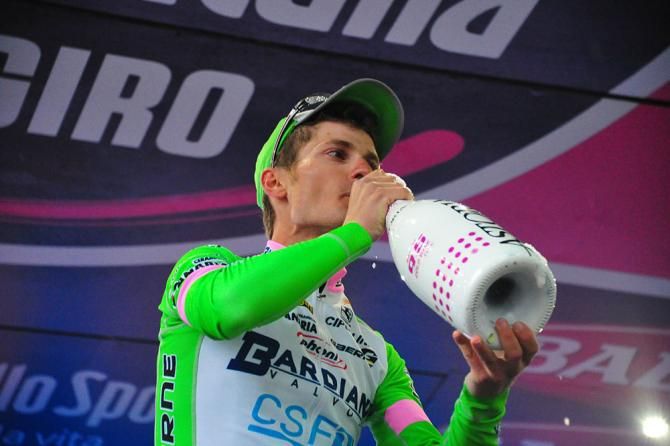 Enrico Battaglin sips some champagne