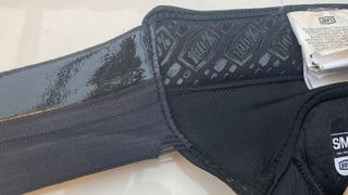 Closeup of wear on fabric of elbow pad
