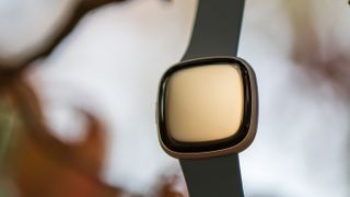 Fitbit Versa 4 straight-on with screen off