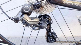 Campy's new 12-speed Record mechanical rear derailleur has a technopolymer body and alloy cage